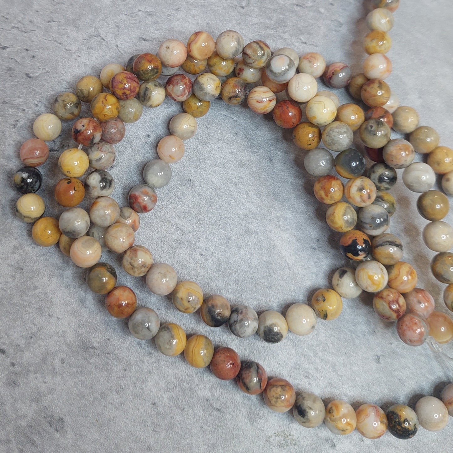 Helmiä 8mm, Crazy Lace akaatti 38cm nauha