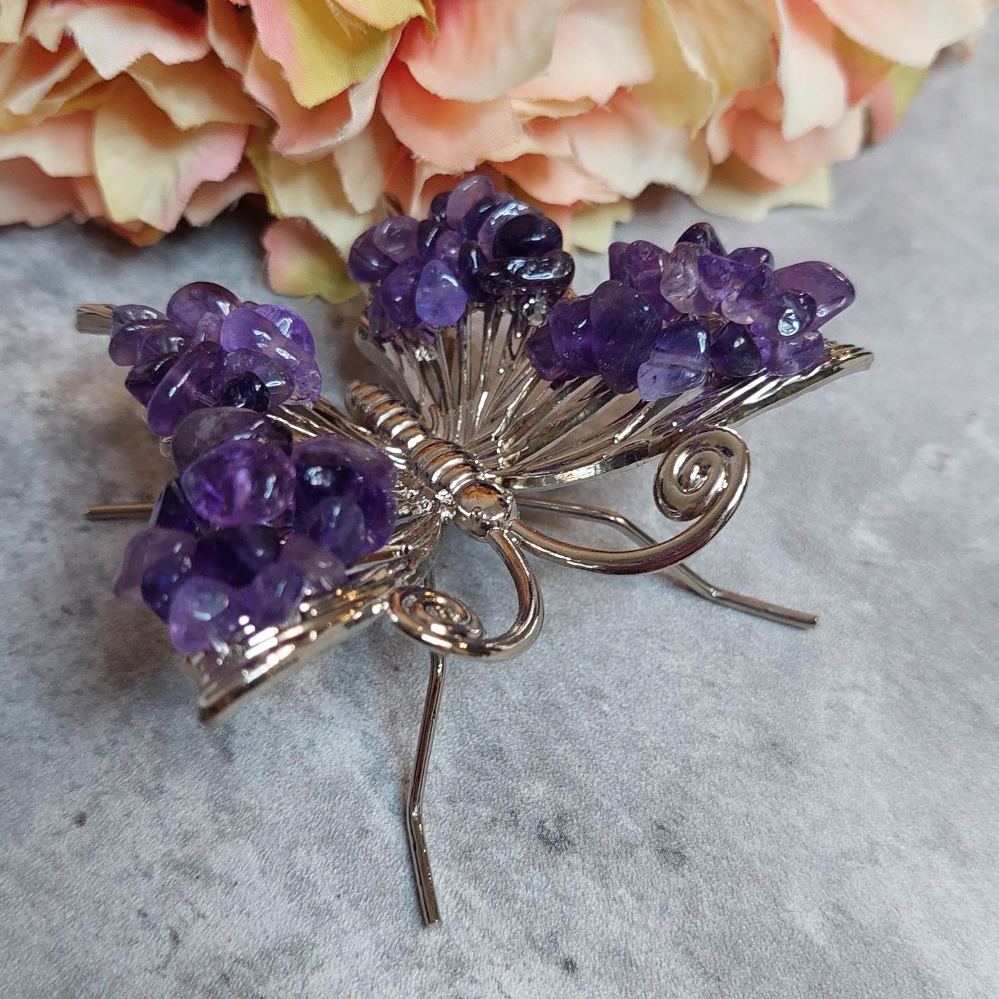 Perhonen sirusiivillä, ametisti