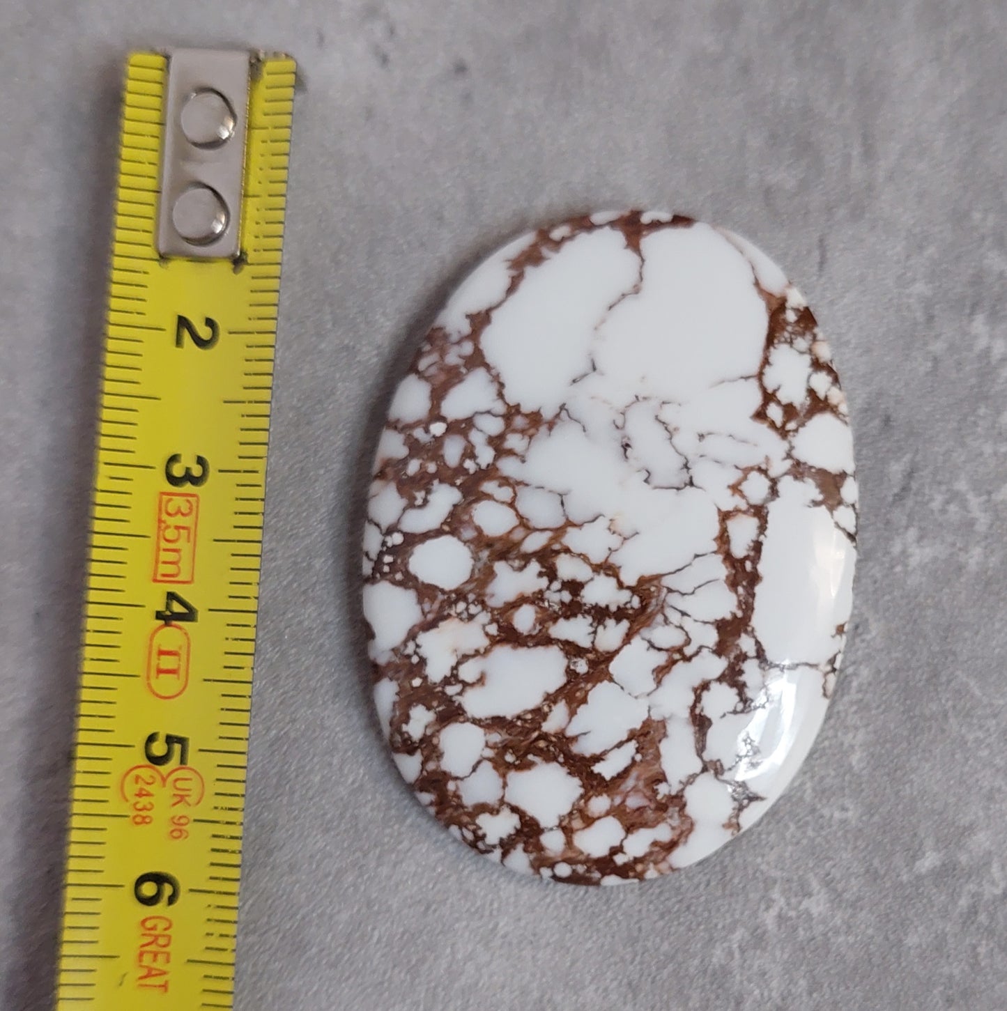 Kapussi, Ovaali Wild Horse Jasper 50x36.5x6mm