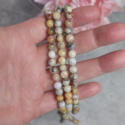 Helmiä 6mm, crazy lace akaatti 38cm nauha