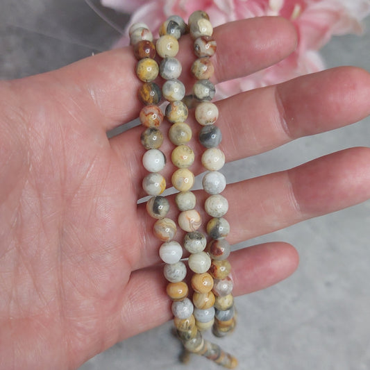 Helmiä 6mm, crazy lace akaatti 38cm nauha