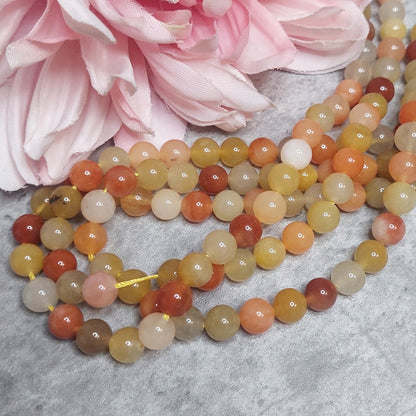 Helmiä 8mm, Gold Silk Jade 38cm nauha