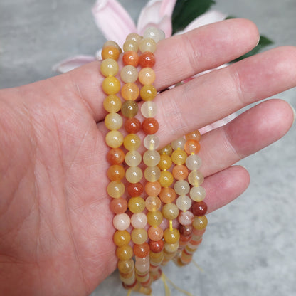Helmiä 6mm, Gold Silk Jade 38cm nauha