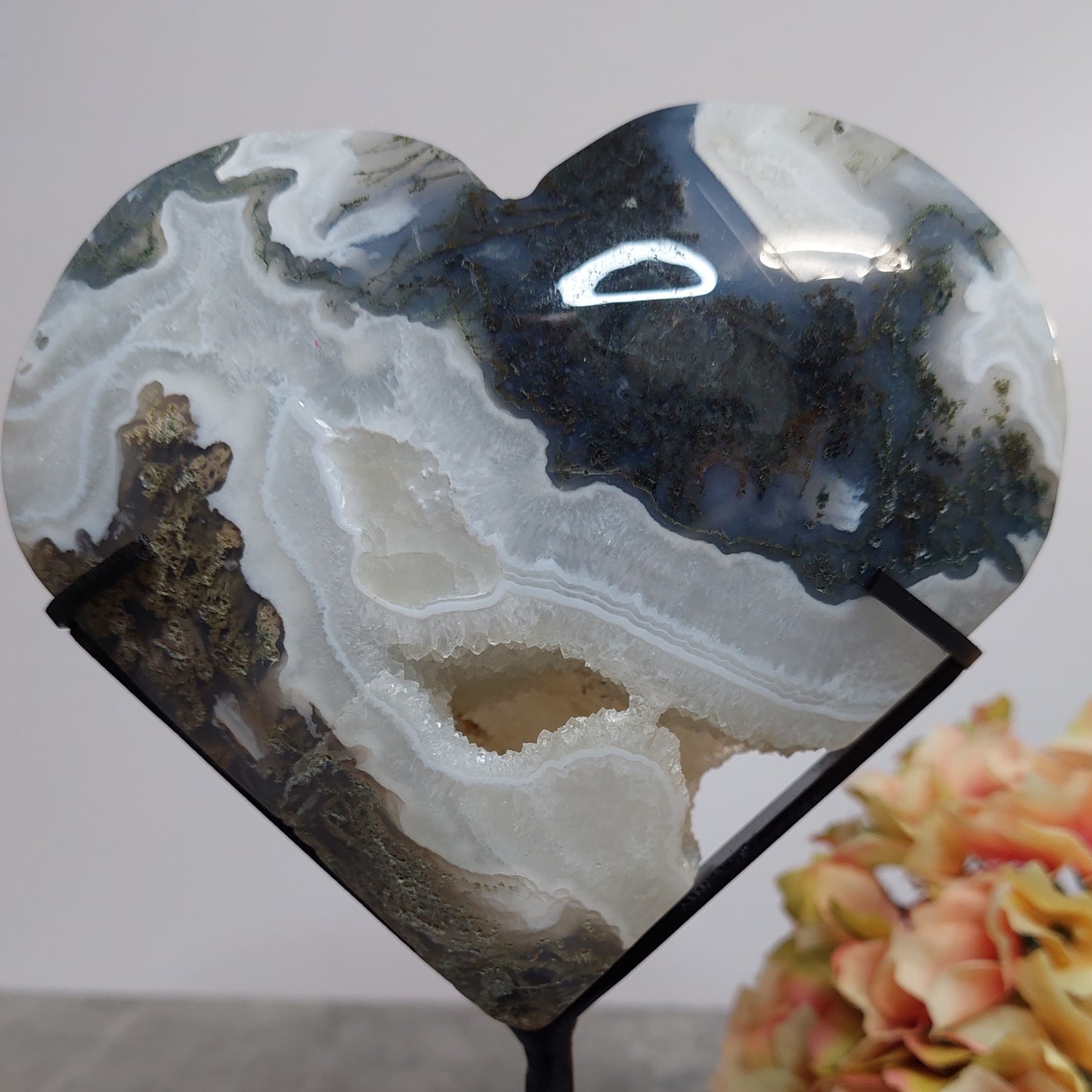 Druusinen sammalakaattisydän jalassa